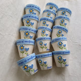 Vasetto con fiore e cuore