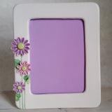 Portafoto con fiori colorati /margherite