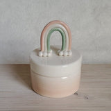 Scatola con arcobaleno