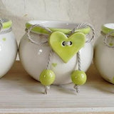 Vasetto con cuore a bottone